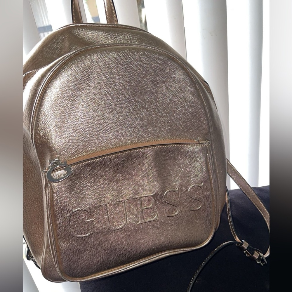Sold —-Rose gold guess book bag